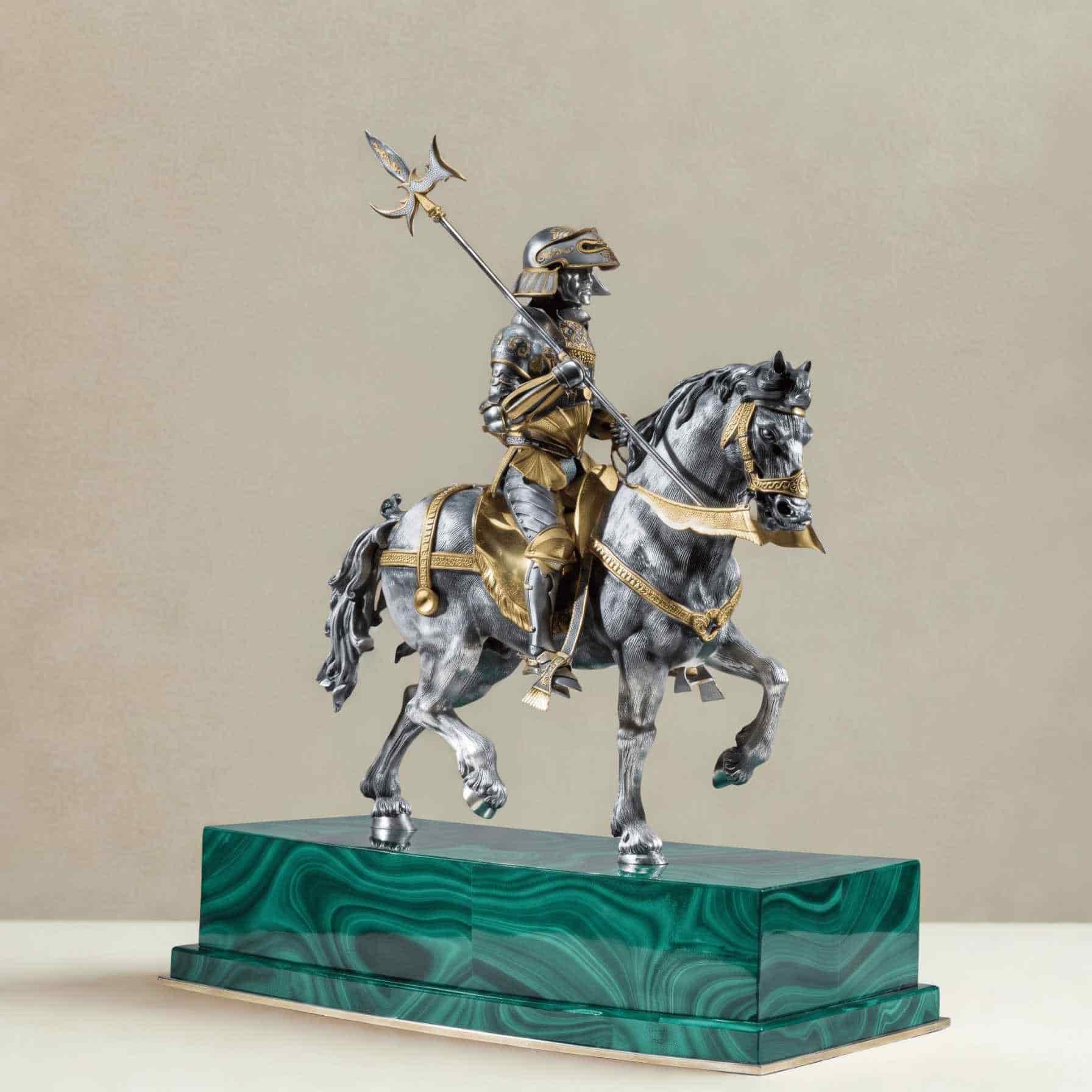 Italian silver parcel-gilt medieval knight on horseback sculpture mounted on a green malachite base