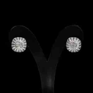 Luxury 18K white gold jewelry set featuring a matching diamond pendant with chain and stud earrings set with princess-cut and brilliant-cut natural diamonds.
