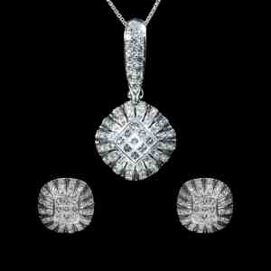 Luxury 18K white gold jewelry set featuring a matching diamond pendant with chain and stud earrings set with princess-cut and brilliant-cut natural diamonds totaling 3.90 carats.