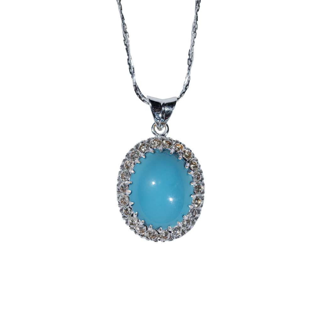 Celeste turquoise halo pendant necklace featuring an oval blue turquoise gemstone with sparkling halo setting