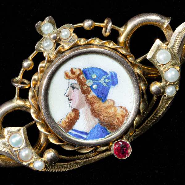 antique victorian gold brooch featuring an original hand-painted porcelain miniature, natural seed pearls, and a ruby accent.