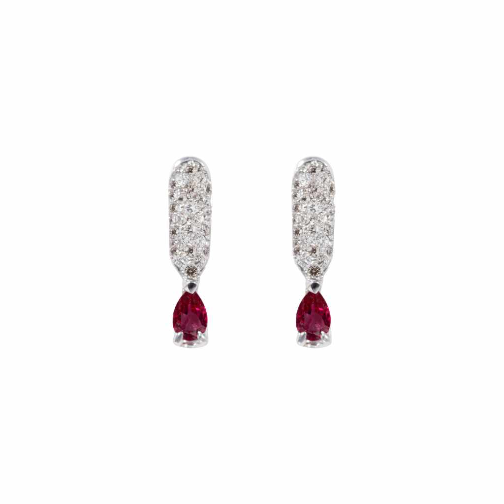 18K white gold drop earrings featuring pear-shaped red rubies and round diamond accents.