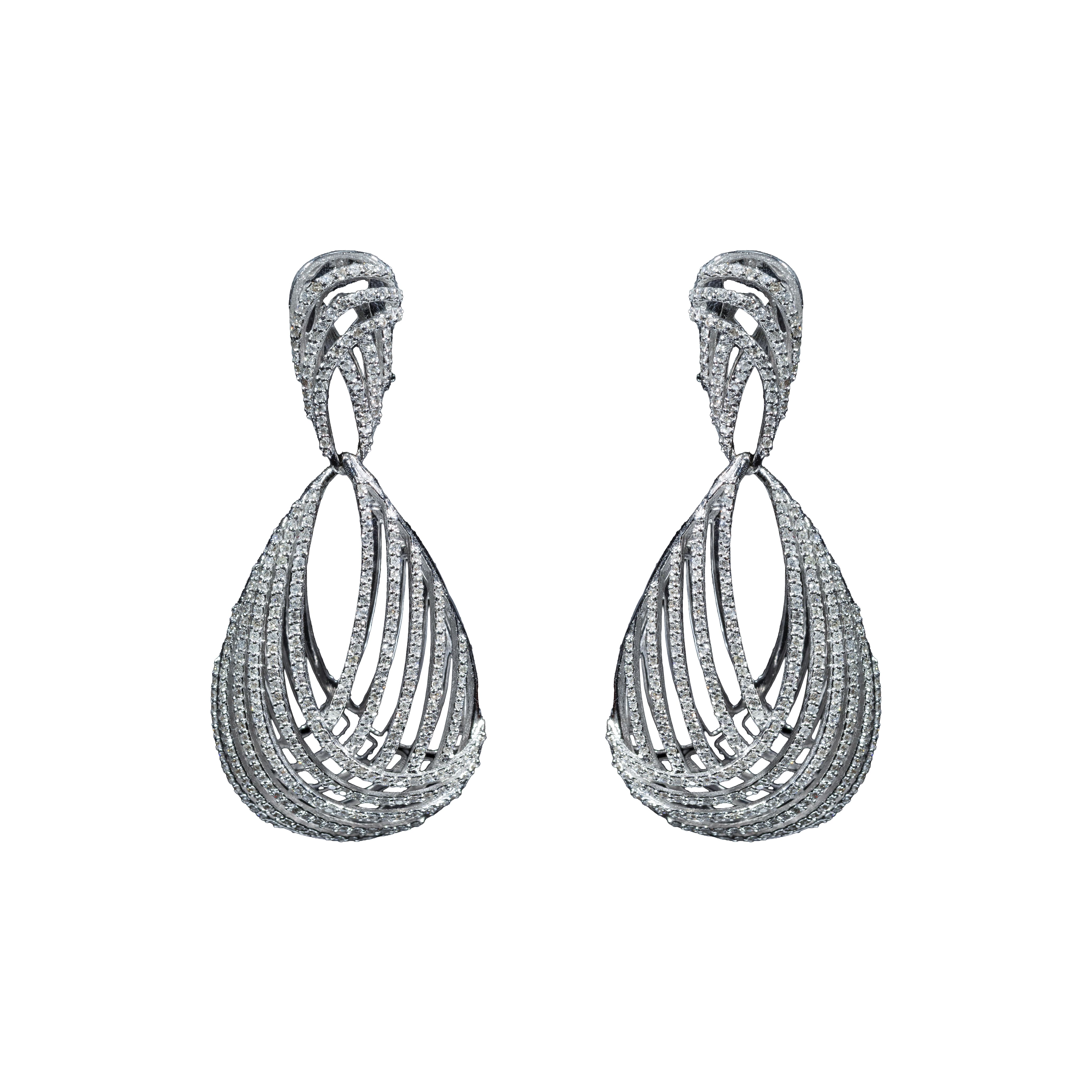 18K white gold statement drop earrings featuring 3.85 carats of diamonds in an intricate multi-row openwork design.