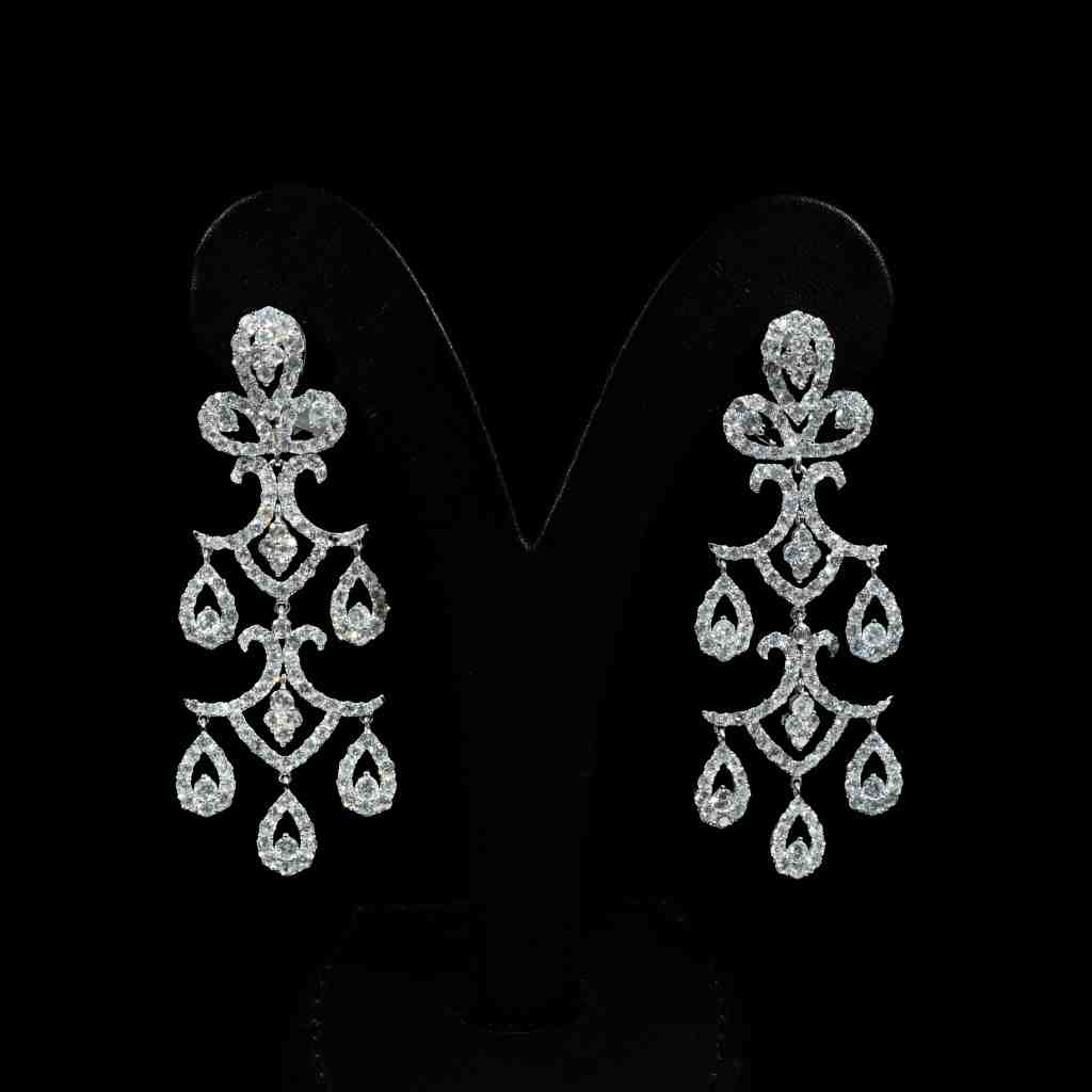 18K white gold chandelier earrings featuring 9.09 carats of round diamonds in an elaborate cascading multi-drop design.