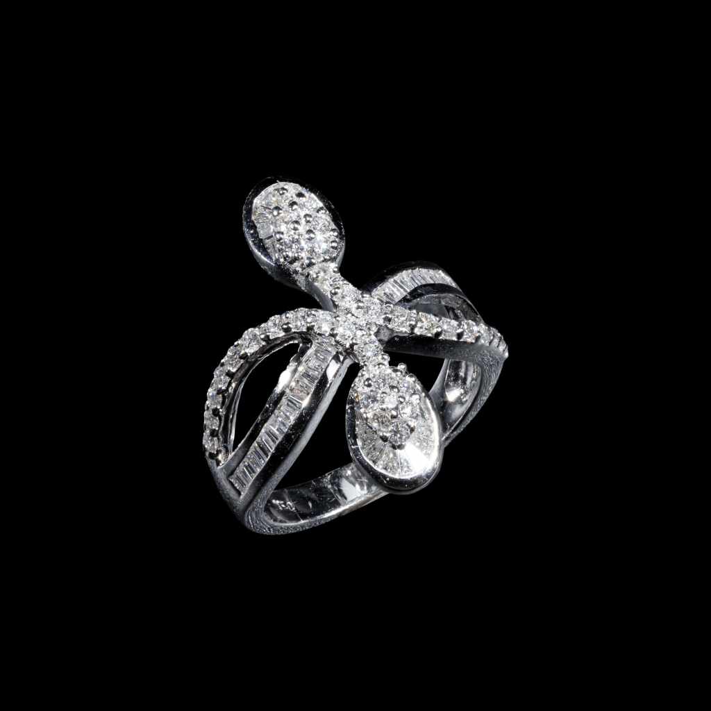 18K white gold statement ring with round and baguette-cut diamonds