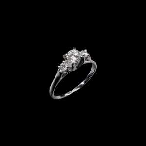 18K white gold three-stone ring with round diamonds