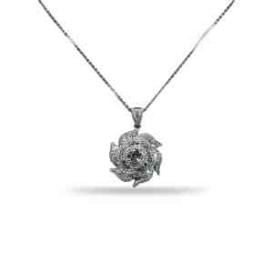 18K white gold floral pendant necklace featuring a 0.60 carat center diamond surrounded by baguette and round brilliant diamonds totaling 2.70 carats.
