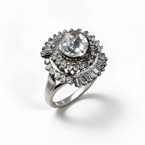 18K white gold diamond cocktail ring with center diamond, baguette-cut and round diamond accents