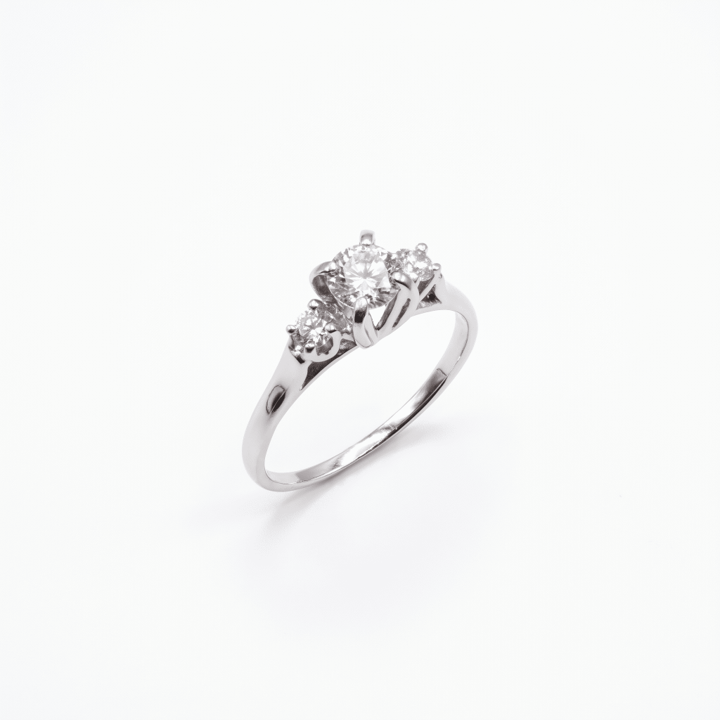 18K white gold three-stone ring with round diamonds