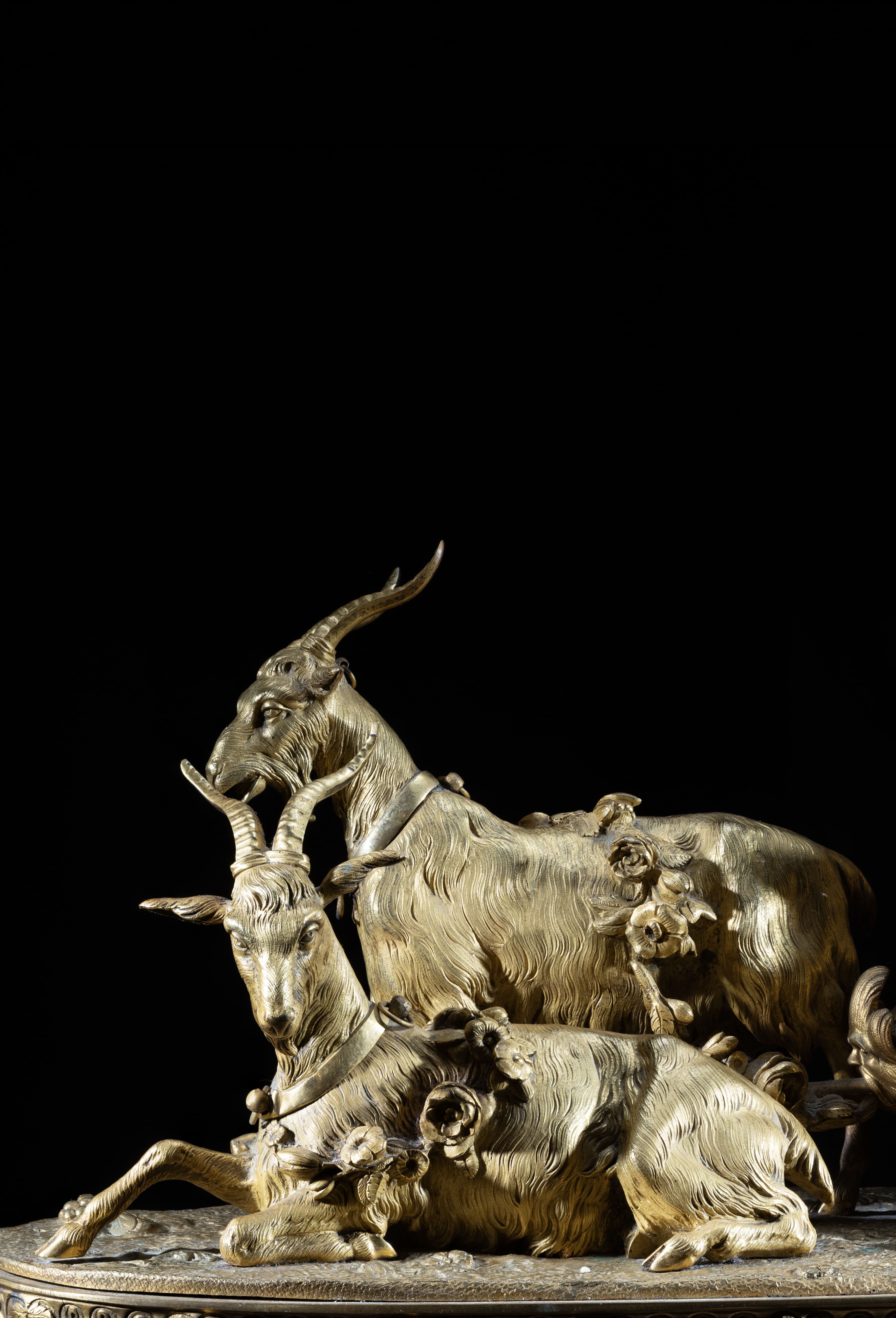 19th-century French bronze and porcelain figural clock with children, goats and carriage scene