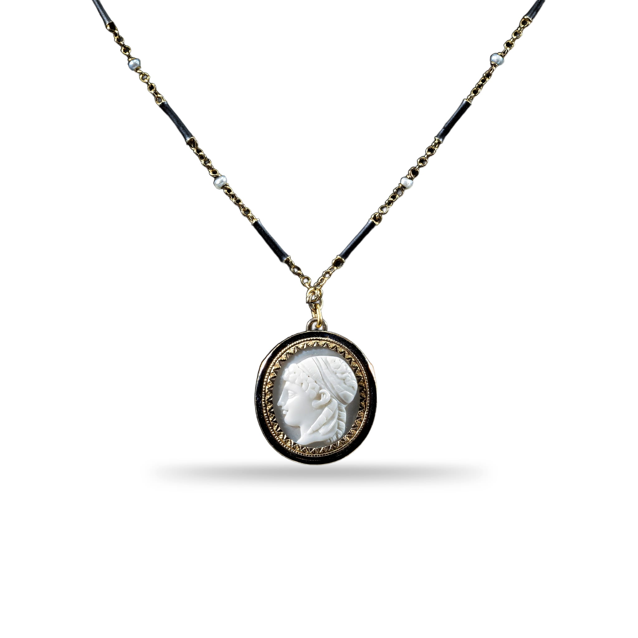 Antique 14K yellow gold cameo pendant necklace featuring a hand-carved classical female profile in a vintage estate setting.