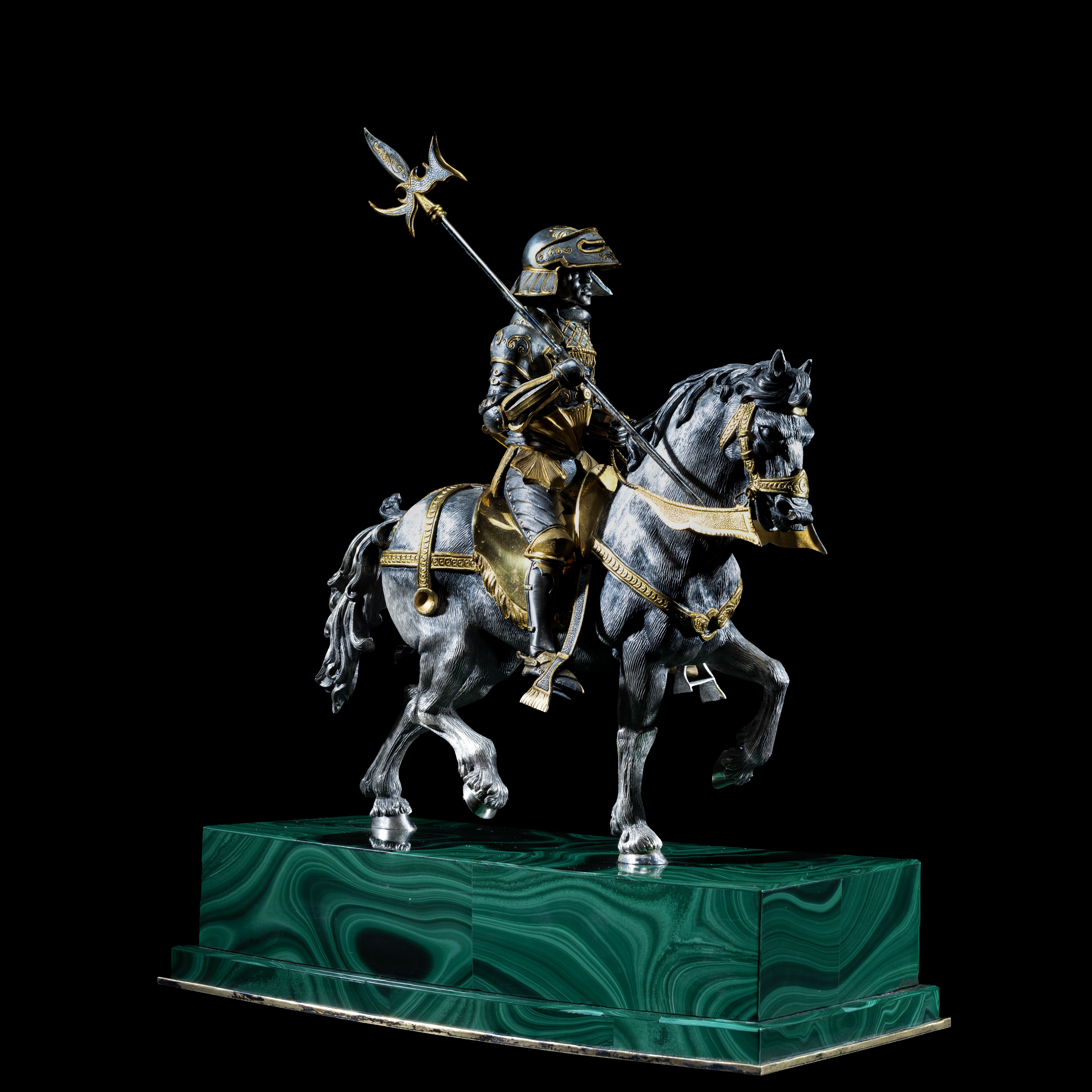 Italian silver parcel-gilt medieval knight on horseback sculpture mounted on a green malachite base