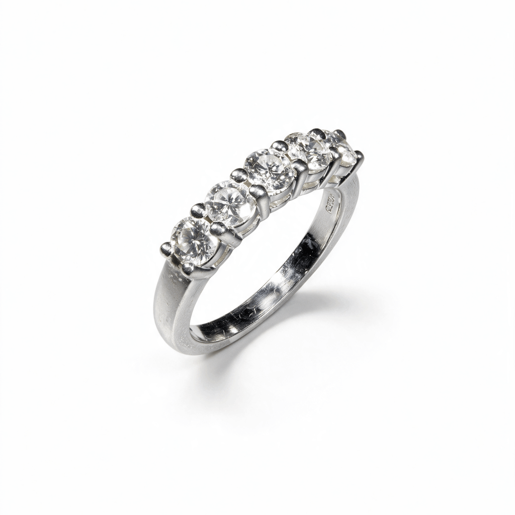 Platinum five-stone ring with five round brilliant diamonds