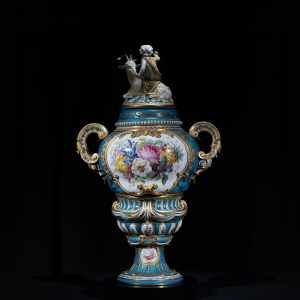 Rare Sèvres turquoise and gilt porcelain vase with hand-painted mythological scene and sculptural child and goat finial