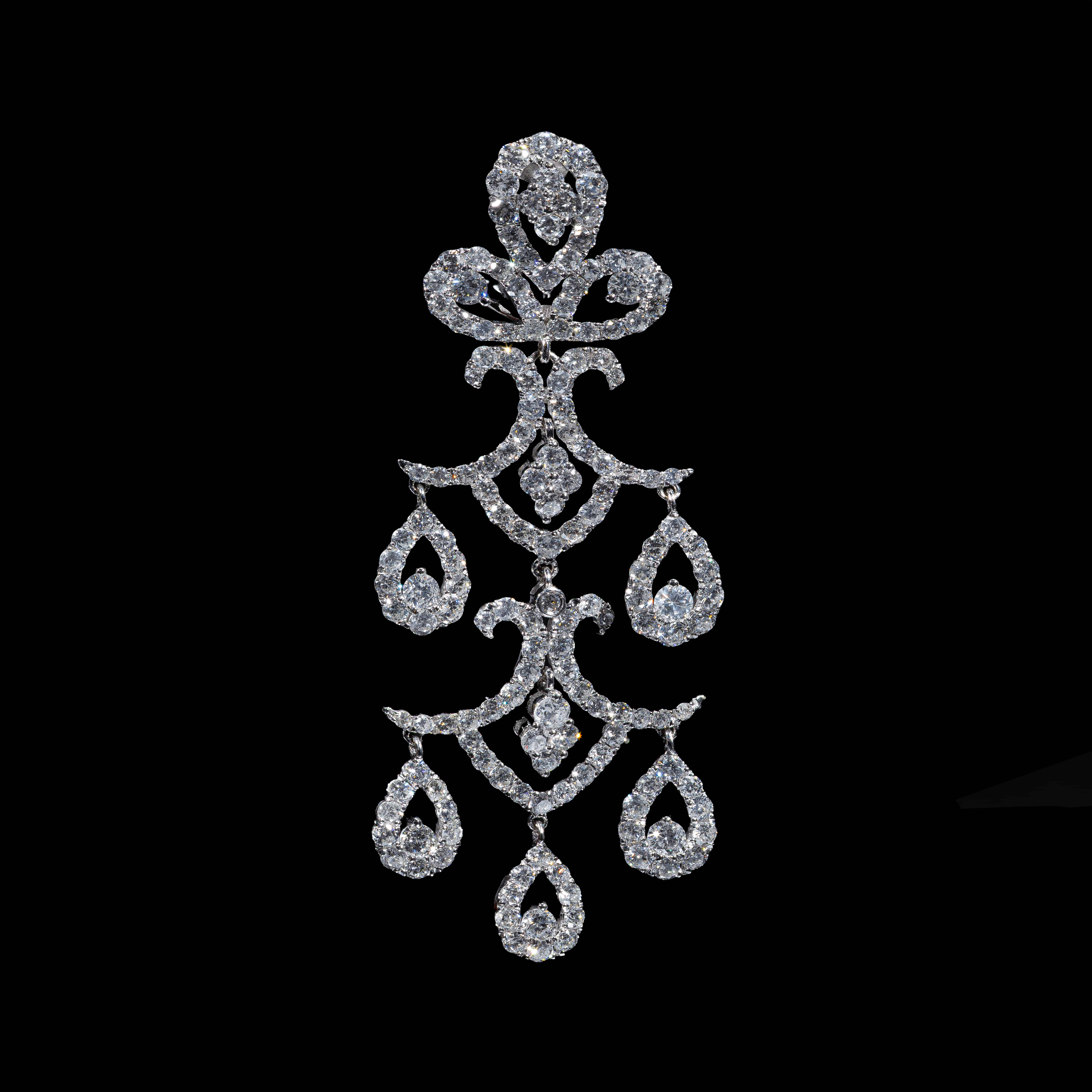 18K white gold chandelier earrings featuring 9.09 carats of round diamonds in an elaborate cascading multi-drop design.