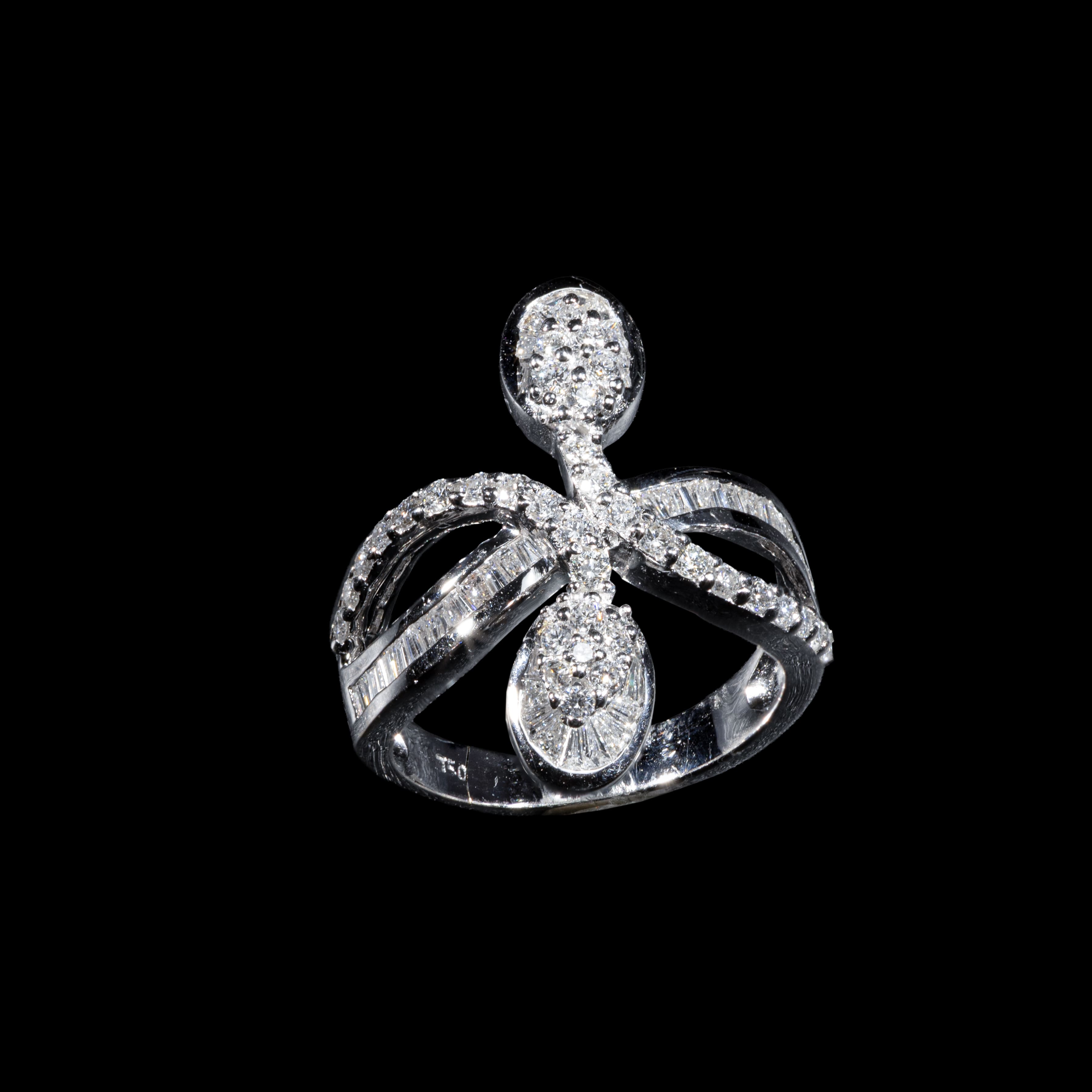 18K white gold statement ring with round and baguette-cut diamonds