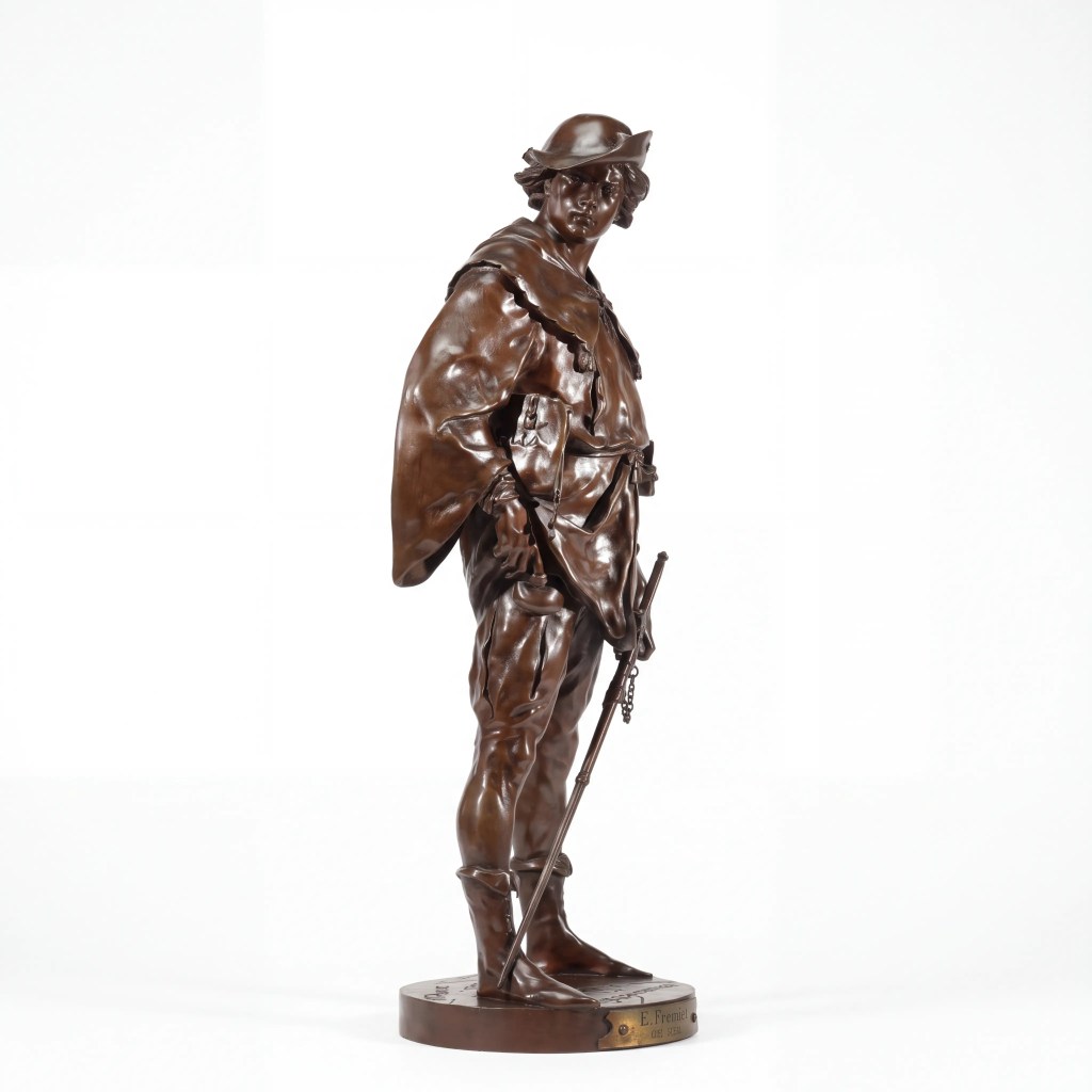 Antique 19th-century French bronze soldier sculpture with rich brown patina and E. Fremiet plaque
