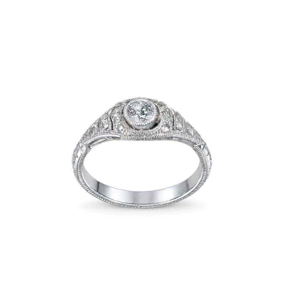 Antique platinum and 14K white gold ring with Old European cut centre diamond and rose cut diamond accents