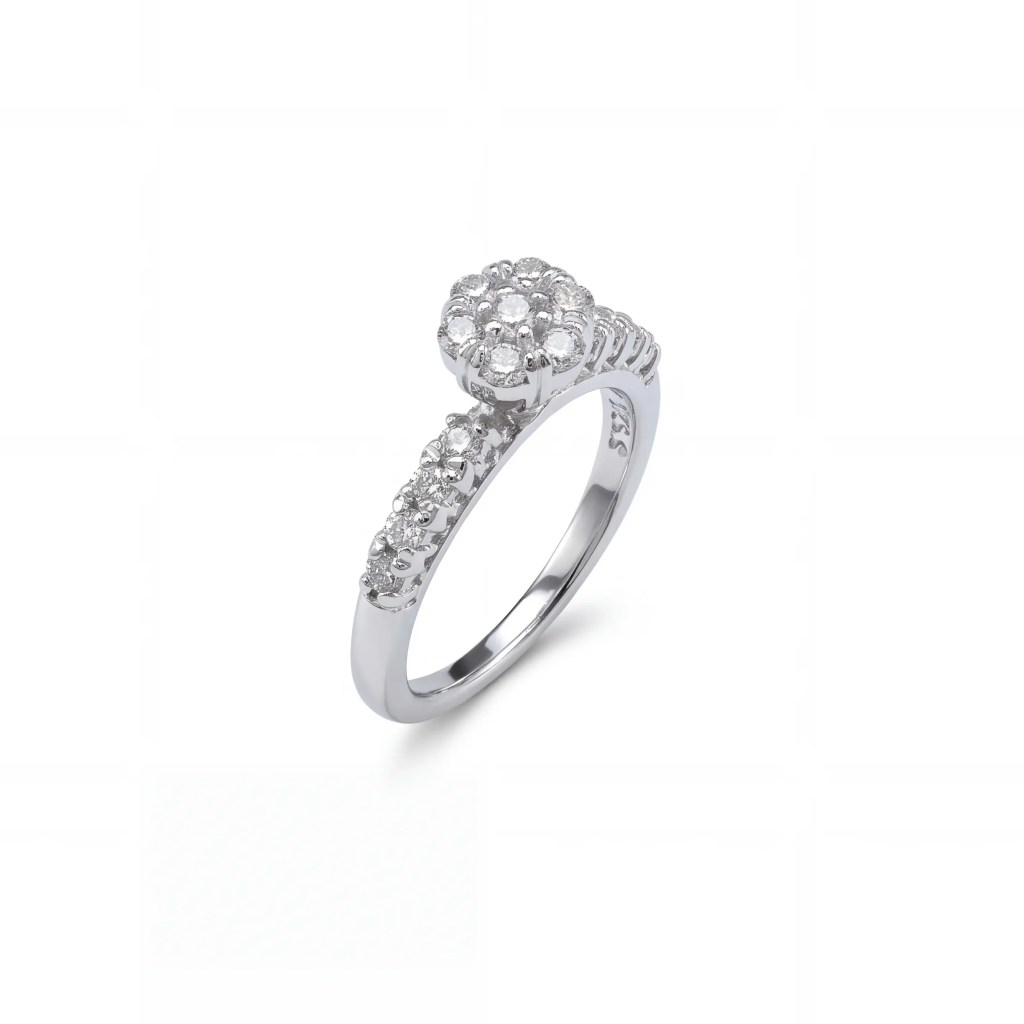 18K white gold diamond floral cluster ring with round brilliant diamonds and diamond-set shoulders.