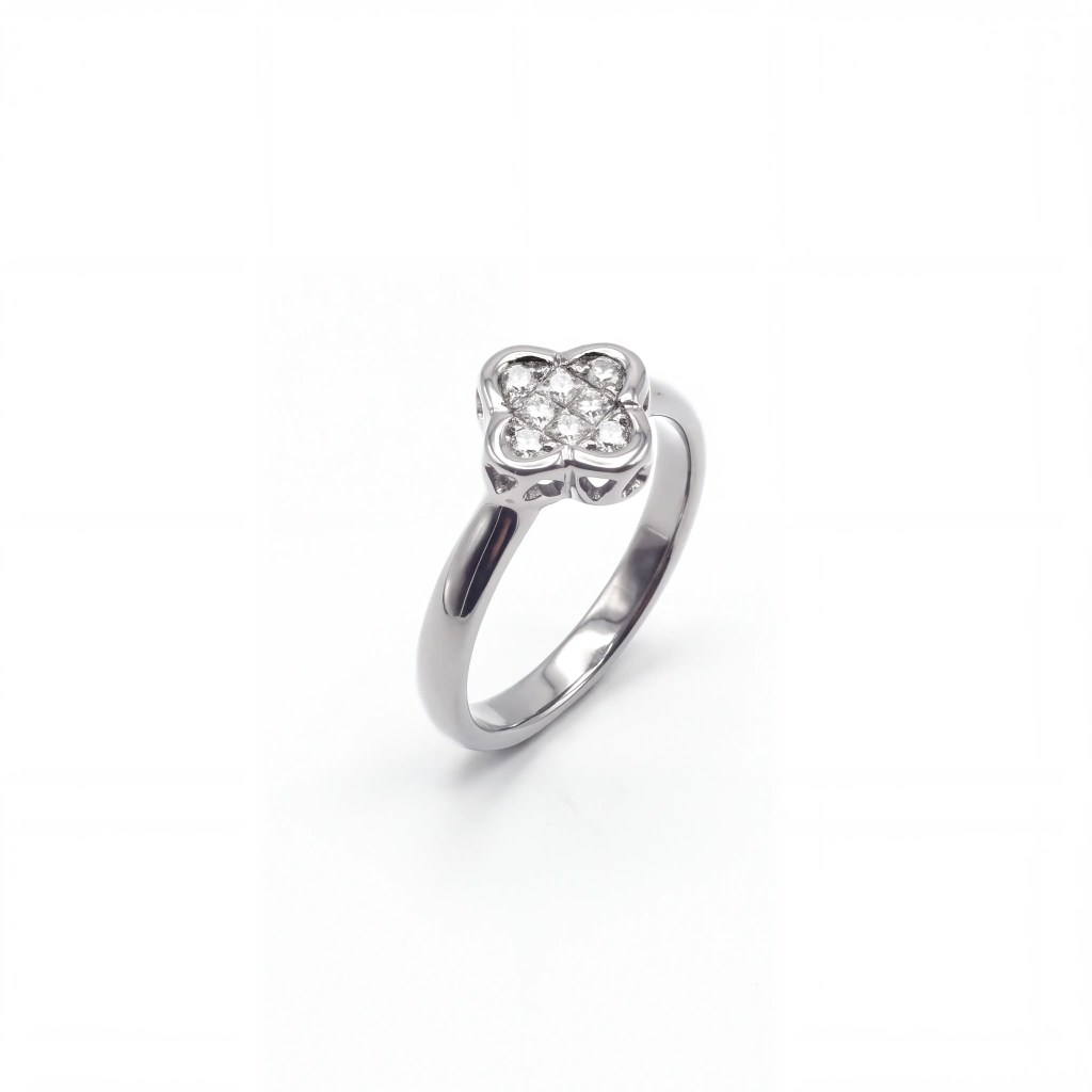 18K white gold cluster ring set with princess-cut diamonds in a floral-inspired design.