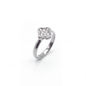 18K white gold cluster ring set with princess-cut diamonds in a floral-inspired design.