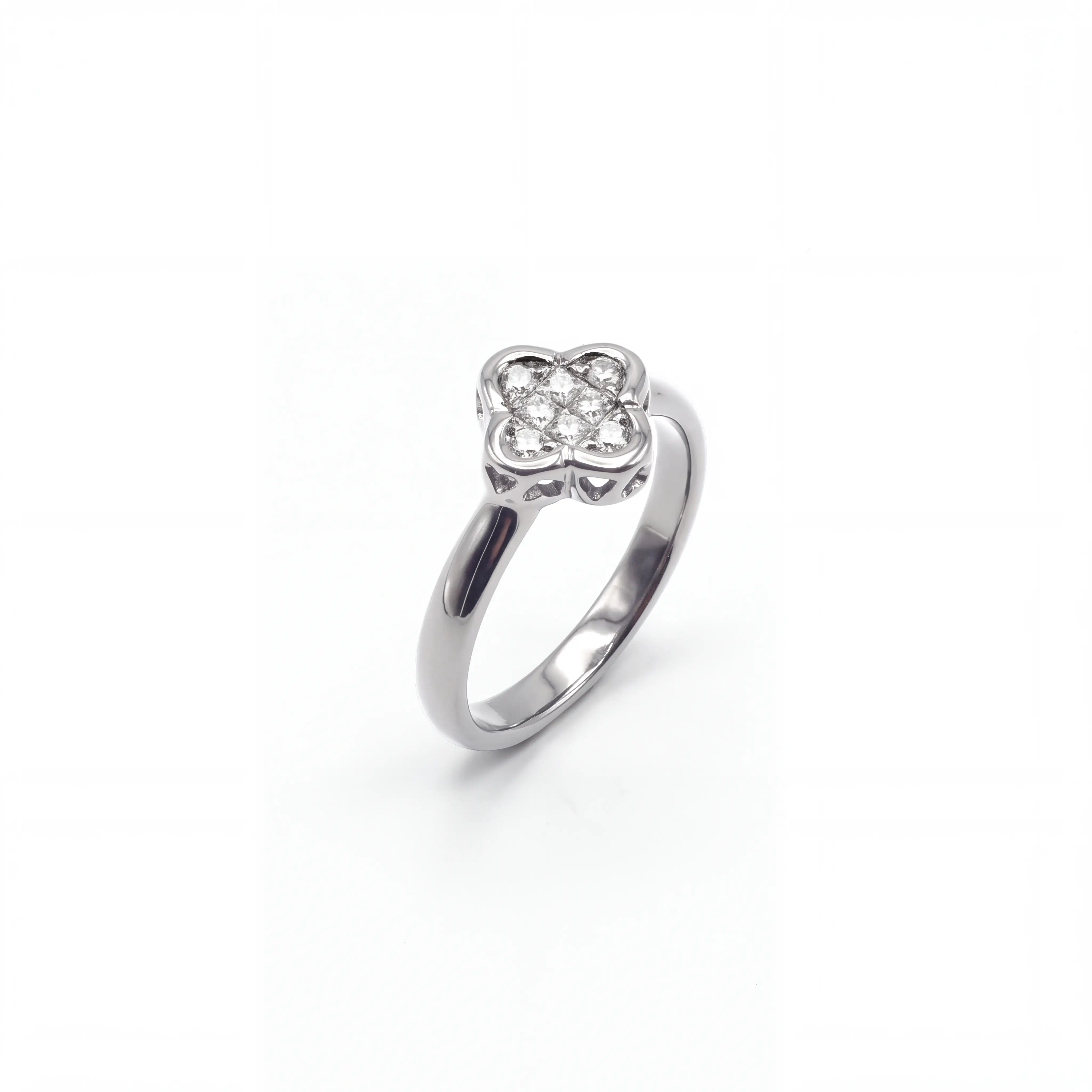 18K white gold cluster ring set with princess-cut diamonds in a floral-inspired design.