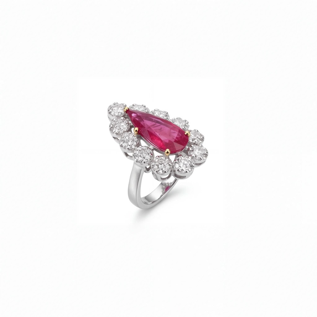 18K white gold ring with pear-shaped ruby and brilliant diamond halo.