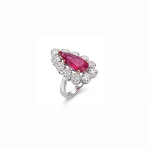 18K white gold ring with pear-shaped ruby and brilliant diamond halo.